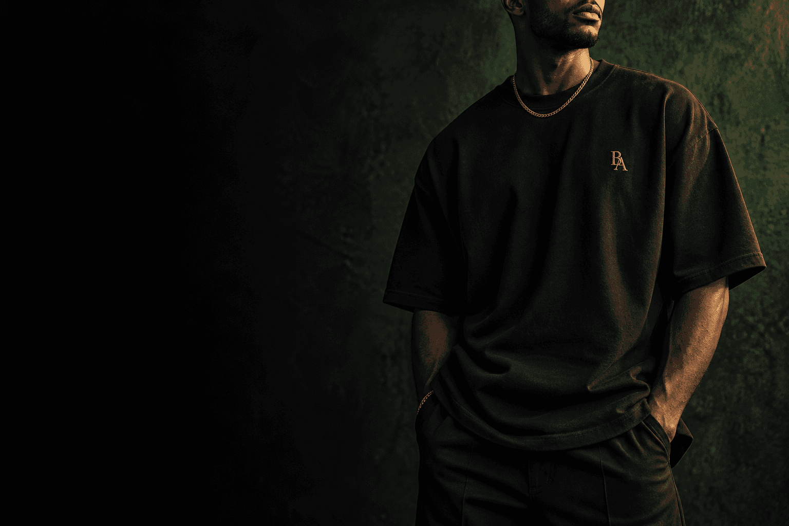 BaileyAs concept campaign: a black signature tee with a gold monogram